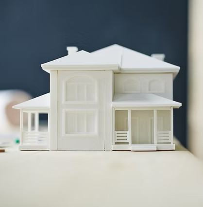 A detailed 3D printed architectural model of a building